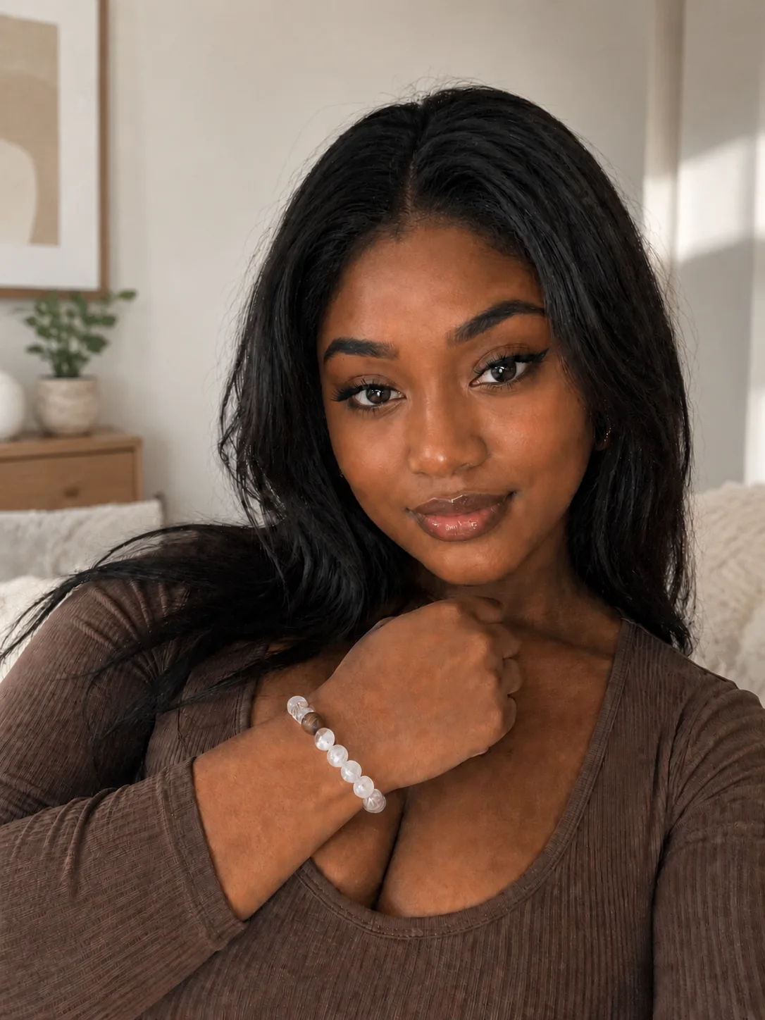 Customer wearing a clear crystal bracelet.