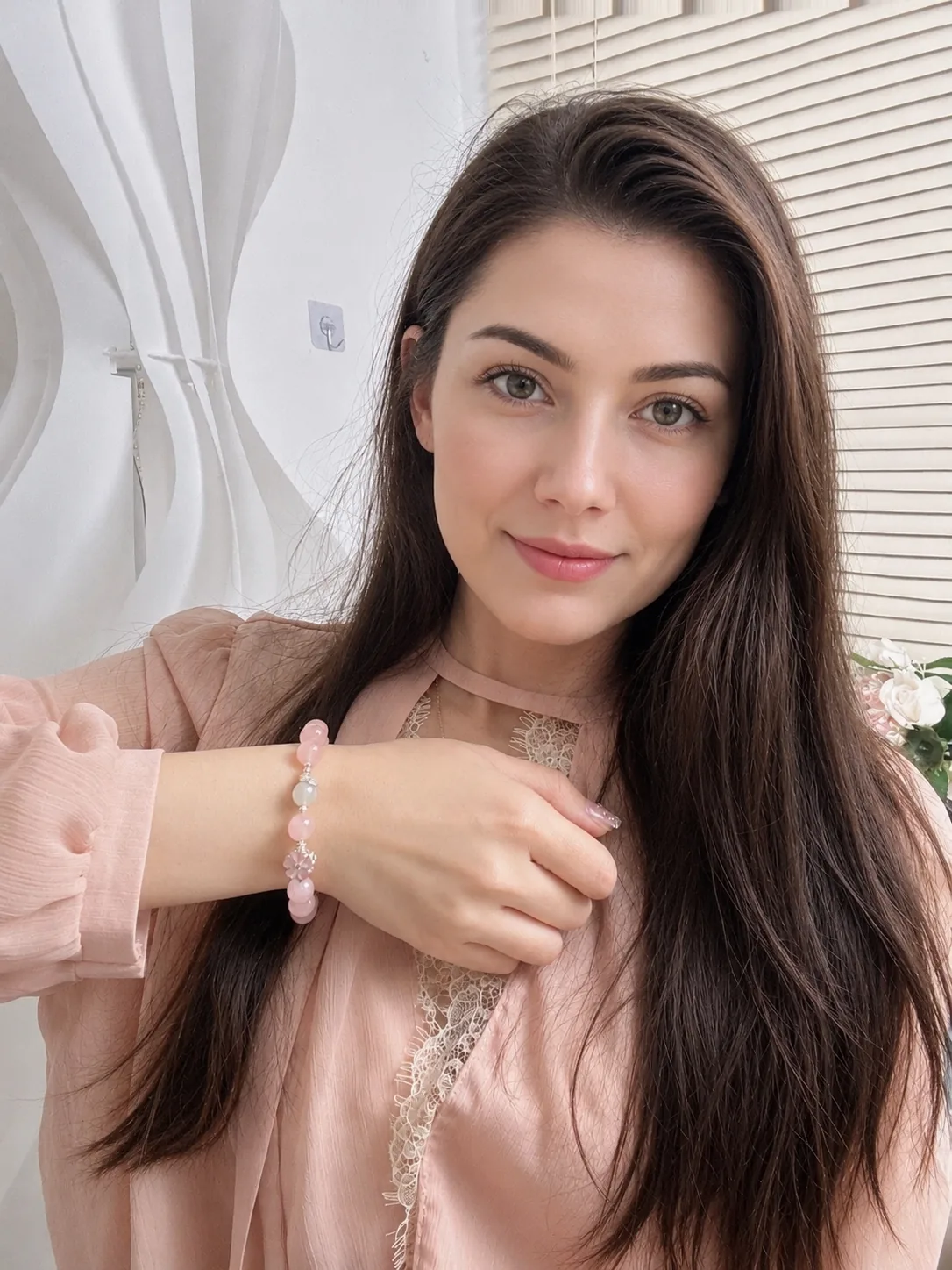 Customer wearing a pink crystal bracelet.